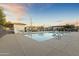 Inviting community pool with surrounding patio at 14575 W Orange Dr, Litchfield Park, AZ 85340
