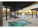 Community hot tub and pool area with lounge chairs at 14575 W Orange Dr, Litchfield Park, AZ 85340