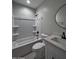 Clean bathroom with a tub, toilet and vanity at 15494 S Kline Pl, Arizona City, AZ 85123