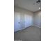 Bedroom with double door closet and neutral tones at 15494 S Kline Pl, Arizona City, AZ 85123