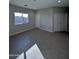Spacious bedroom with tile floors and double closets at 15494 S Kline Pl, Arizona City, AZ 85123
