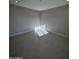 Simple bedroom with tile floors and a window at 15494 S Kline Pl, Arizona City, AZ 85123