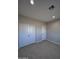 Spacious bedroom featuring double closets and neutral decor at 15494 S Kline Pl, Arizona City, AZ 85123