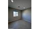 Simple bedroom with neutral walls and tile floors at 15494 S Kline Pl, Arizona City, AZ 85123