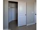 Small reach-in closet with a single rod and shelf at 15494 S Kline Pl, Arizona City, AZ 85123