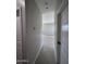 Bright hallway connecting rooms in the home at 15494 S Kline Pl, Arizona City, AZ 85123