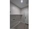 Laundry room with built-in shelving and hookups at 15494 S Kline Pl, Arizona City, AZ 85123