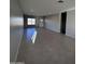 Bright living room with tile floors and recessed lighting at 15494 S Kline Pl, Arizona City, AZ 85123