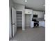 Walk-in pantry with ample shelving for storage at 15494 S Kline Pl, Arizona City, AZ 85123
