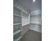 Spacious walk-in closet with ample shelving and hanging space at 15494 S Kline Pl, Arizona City, AZ 85123