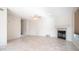 Bright living room featuring a fireplace and tile flooring at 16049 S 27Th Pl, Phoenix, AZ 85048