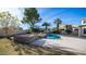 Relaxing pool area with stonework and seating at 16049 S 27Th Pl, Phoenix, AZ 85048