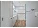 Bathroom with walk-in shower, double vanity, and modern fixtures at 18852 N 260Th Ln, Buckeye, AZ 85396