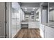 Elegant bathroom with dual vanities, granite countertops and a large shower at 18852 N 260Th Ln, Buckeye, AZ 85396