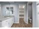 Main bathroom features a spacious vanity and walk-in closet at 18852 N 260Th Ln, Buckeye, AZ 85396