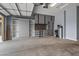 Garage with built-in cabinets and workspace at 18852 N 260Th Ln, Buckeye, AZ 85396