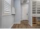Hallway with access to pantry and laundry room at 18852 N 260Th Ln, Buckeye, AZ 85396