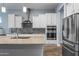 Modern kitchen with stainless steel appliances and granite countertops at 18852 N 260Th Ln, Buckeye, AZ 85396