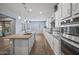 Spacious kitchen featuring an island and ample cabinet space at 18852 N 260Th Ln, Buckeye, AZ 85396