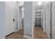 Large walk-in pantry with ample shelving and drawers at 18852 N 260Th Ln, Buckeye, AZ 85396