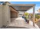 Covered patio with pergola, offering shade and outdoor space at 18852 N 260Th Ln, Buckeye, AZ 85396