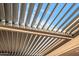 Modern pergola with adjustable louvers and lighting at 18852 N 260Th Ln, Buckeye, AZ 85396