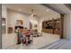 Living room with large sectional sofa, entertainment center and sliding doors to patio at 2330 E Brooks Farm Rd, Gilbert, AZ 85298