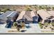 Single-story home with a two-car garage and landscaped yard at 24274 N 170Th Ln, Surprise, AZ 85387