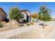 Landscaped front yard with drought-tolerant plants and gravel at 24274 N 170Th Ln, Surprise, AZ 85387