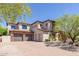 Luxury home with two-car garage and paver driveway at 2671 S Moonlight Dr, Gold Canyon, AZ 85118