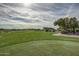 Golf course with a tree-lined path at 2671 S Moonlight Dr, Gold Canyon, AZ 85118