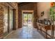 Elegant entry with high ceilings and grand staircase at 2671 S Moonlight Dr, Gold Canyon, AZ 85118