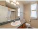 Bathroom with a bathtub, toilet, sink, and grab bars at 3301 S Goldfield Rd # 2015, Apache Junction, AZ 85119