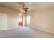 Spacious Primary bedroom with ceiling fan and carpet at 3301 S Goldfield Rd # 2015, Apache Junction, AZ 85119