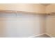 Large walk-in closet with double hanging rods at 3301 S Goldfield Rd # 2015, Apache Junction, AZ 85119