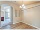 Bright dining room with wood floors and access to other rooms at 3301 S Goldfield Rd # 2015, Apache Junction, AZ 85119