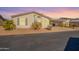 Tan single story home with carport and desert landscaping at 3301 S Goldfield Rd # 2015, Apache Junction, AZ 85119