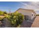 House exterior showcasing landscaping and AC unit at 3301 S Goldfield Rd # 2015, Apache Junction, AZ 85119