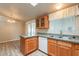 Kitchen with double sink, dishwasher, and ample counter space at 3301 S Goldfield Rd # 2015, Apache Junction, AZ 85119
