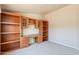 Spacious home office with extensive built-in shelving at 3301 S Goldfield Rd # 2015, Apache Junction, AZ 85119