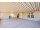 Covered patio with screened enclosure and concrete flooring at 3301 S Goldfield Rd # 2015, Apache Junction, AZ 85119