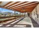 Covered deck with ceiling fan offering scenic views at 3537 W Meander Rd, New River, AZ 85087