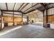 Spacious workshop with large overhead door and ample storage at 3537 W Meander Rd, New River, AZ 85087