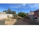 Backyard with fruit trees and bikes at 3818 W Rose Ln, Phoenix, AZ 85019
