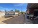 Backyard with trampoline, patio furniture, and grill at 3818 W Rose Ln, Phoenix, AZ 85019