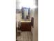 Clean bathroom with wood vanity and tile flooring at 3818 W Rose Ln, Phoenix, AZ 85019