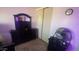 Bedroom with dresser, TV, and a ceiling fan at 3818 W Rose Ln, Phoenix, AZ 85019