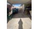 Covered carport with storage and some items at 3818 W Rose Ln, Phoenix, AZ 85019