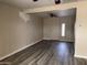 Living room with wood-look floors and ceiling fan at 3914 W Monte Vista Rd, Phoenix, AZ 85009