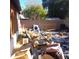 Backyard area with discarded items and needs cleanup at 5431 W Cholla St, Glendale, AZ 85304